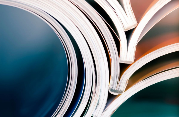 stack of open magazines